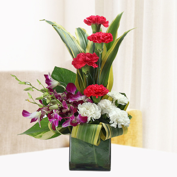 Red & White Carnations with Orchids Glass Vase Arrangement