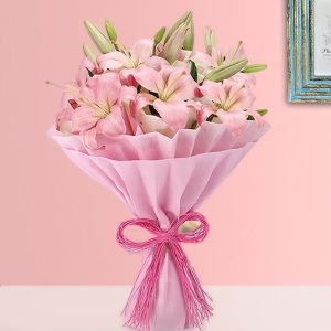 Elegant Pink Lilies Hand Bouquet in Pink Wrap