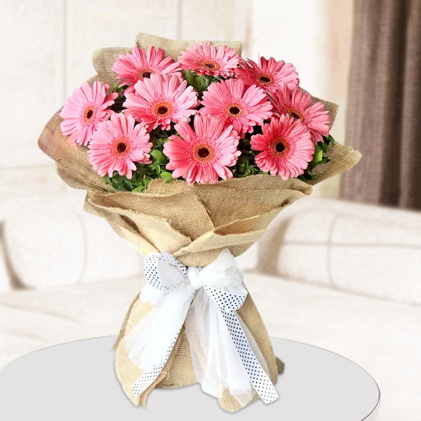 12 Pink Gerberas Hand Tied Jute Bouquet