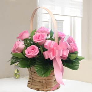 12 Pink Roses in Decorative Basket Arrangement