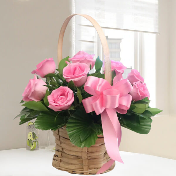 12 Pink Roses in Decorative Basket Arrangement