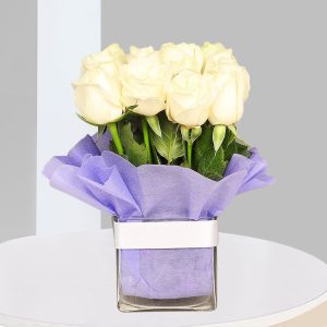 Charming White Roses in Stylish Square Vase
