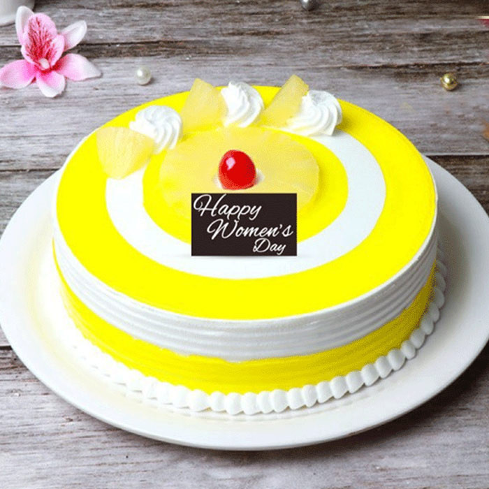 Elegant White Forest Cake with Chocolate Decor