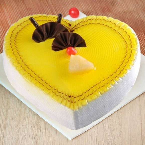 Yellow Heart-Shaped Pineapple Cream Cake