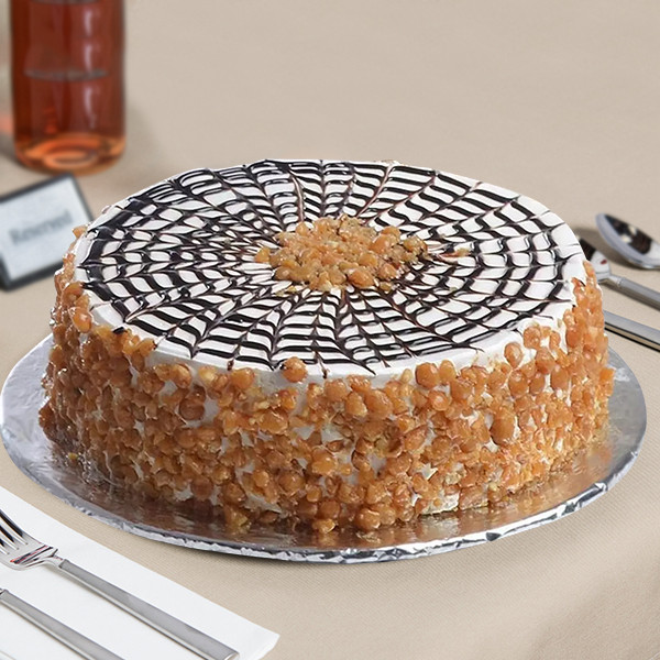 Crunchy Caramel Designer Cake with Cream Frosting