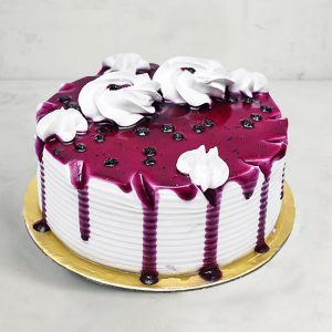 Blueberry Drip Cake with White Cream Swirls