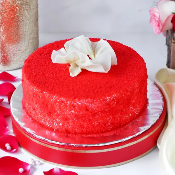 Elegant Red Velvet Crumb Cake with White Floral Top