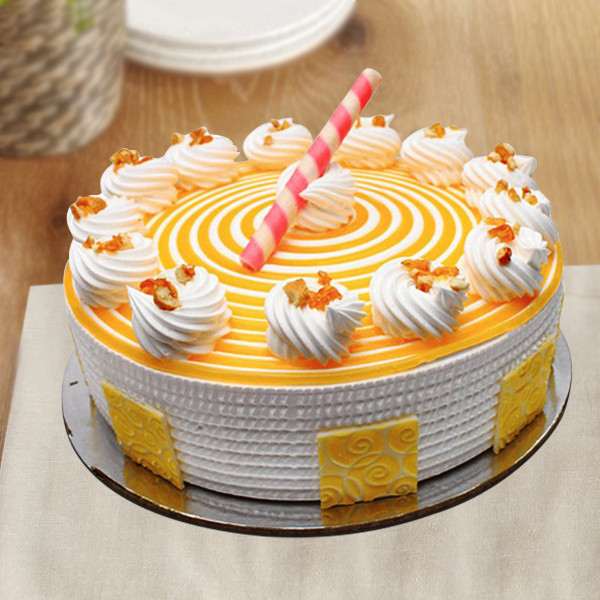 Butterscotch Swirl Delight Cake with Cream Toppings